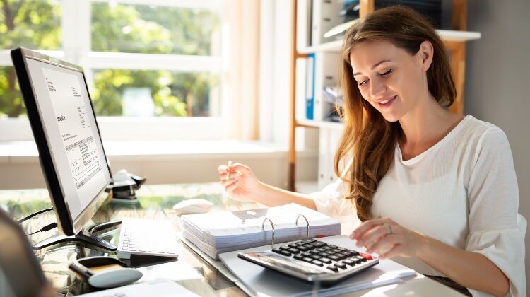 Accountancy Jobs. Accountant working in her office.